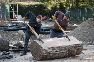 Flipping the log so the other side can be cut