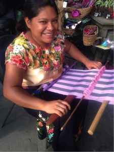 Yolanda uses the back strap to weave all of her clothes including skirts, scarfs, and bags.