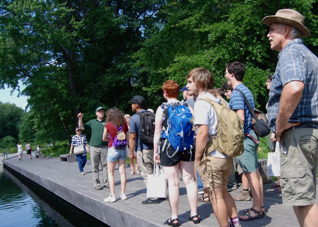 Interns and green professionals join Michael Hagen in the Native Plant Garden.