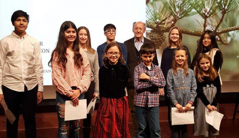 Photo of the winners of 2019's NYBG young poets contest with Billy Collins