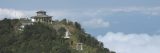 image of huts on a mountain in Asia