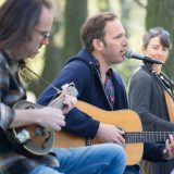 A band performs acoustically on the Garden's grounds.