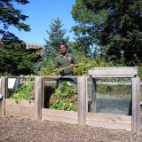 Garden staff working in a compost center