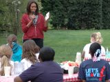 Michelle Obama with a student in the White House vegetable garden