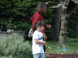 Michelle Obama with a student in the White House vegetable garden