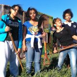 Image of local Bronx ladies working in a community garden.