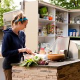 An NYBG employee working in the Edible Academy's kitchen.