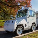 Image of electric truck pulling NYBG Trams