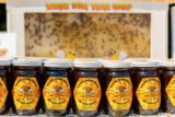 An arrangement of individual jars of honey