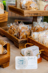 Small rectangular baskets full of individually wrapped baked desserts