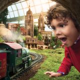 A child marves at a train at the Holiday Train Show.