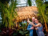A couple taking a selfie in the Conservatory