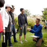 An instructor teaching guests at the Edible Academy