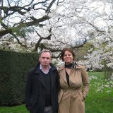 Erik Dhont and Anette Freytag standing in front of a tree with white flowers