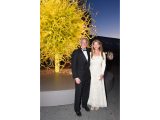 Eaddo Kiernan and Andrew Kiernan in front of a yellow display at the Conservatory Ball