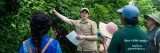 Instructor teaching guests about plants