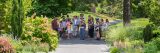 Guests listening to an instructor in a summer intensive class in Perennial Garden