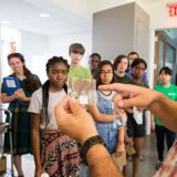 Students listening to a presentation