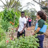 Photo of a guest on an Urban Farm Tour