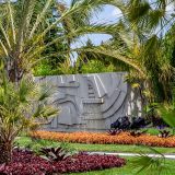 A sculptural fountain surrounded by Brazilian plants.