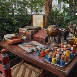 Image of table of paints from Frida Kahlo's garden in the Conservatory