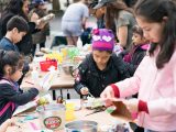 children painting egg crates for crafts duirng citizen science weekend