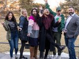 group of people posing for photo with smiles from plantlove weekend