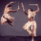 Two dancers from Nego Gato performing.