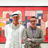 Raymond Jungles and Edward Sullivan standing in front of a Burle Marx painting.