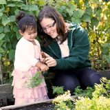 Photo of kids in the vegetable garden