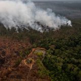 Smoke rises as fires burn in the Amazon rainforest near Porto Velho, the capital city of RondÙnia, Brazil, on Monday, Aug. 26, 2019. (Victor Moriyama/The New York Times)