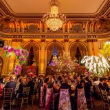 Photo of patrons to the Orchid Dinner in the Plaza ballroom