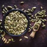 Photo of cardamom pods in a bowl