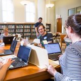 Photo of editors in the reading room