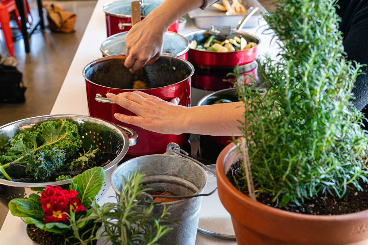 Photo of Aaron Bertelsen cooking in the Edible Academy