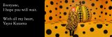 Kusama sitting next to pumpkin with the quote