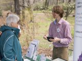 NYBG staffer orients a citizen science volunteer in the Native Plant Garden