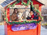 2 children with stuffed animals at the Children's Puppet Theater