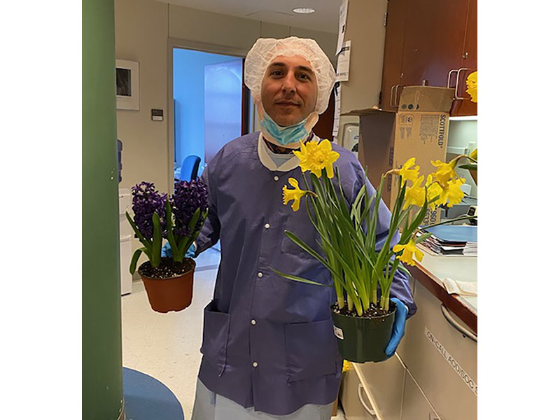 Photo of medical staff receiving flowers