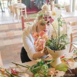 Amy Roberts creating a floral arrangement