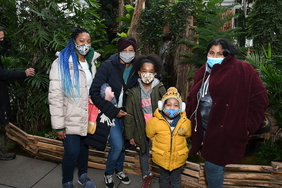 Photo of attendees in the Holiday Train Show during Bronx Community Member Days