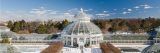 An aerial view of the Conservatory and its courtyards with snow blanketing the surrounding landscape.