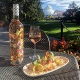 Appetizer and glass of rose in front of the Conservatory