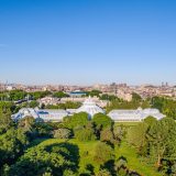 An aerial view of the Enid A. Haupt Conservatory and New York City