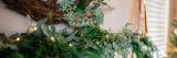 Garland and dried plant material have been arranged into wreathes and home decor