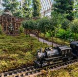 Holiday Train Show model train in front of LuEsther T. Mertz Library Building replica - cropped