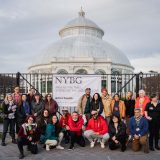 Large group of people in front of the NYBG conservatory
