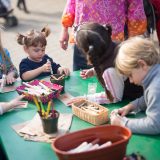 a group of children crafting