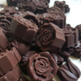small chocolate pieces in various flower shapes