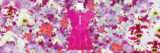 A pink design for a dress surrounded by hundreds of pink, red, purple, and white orchids